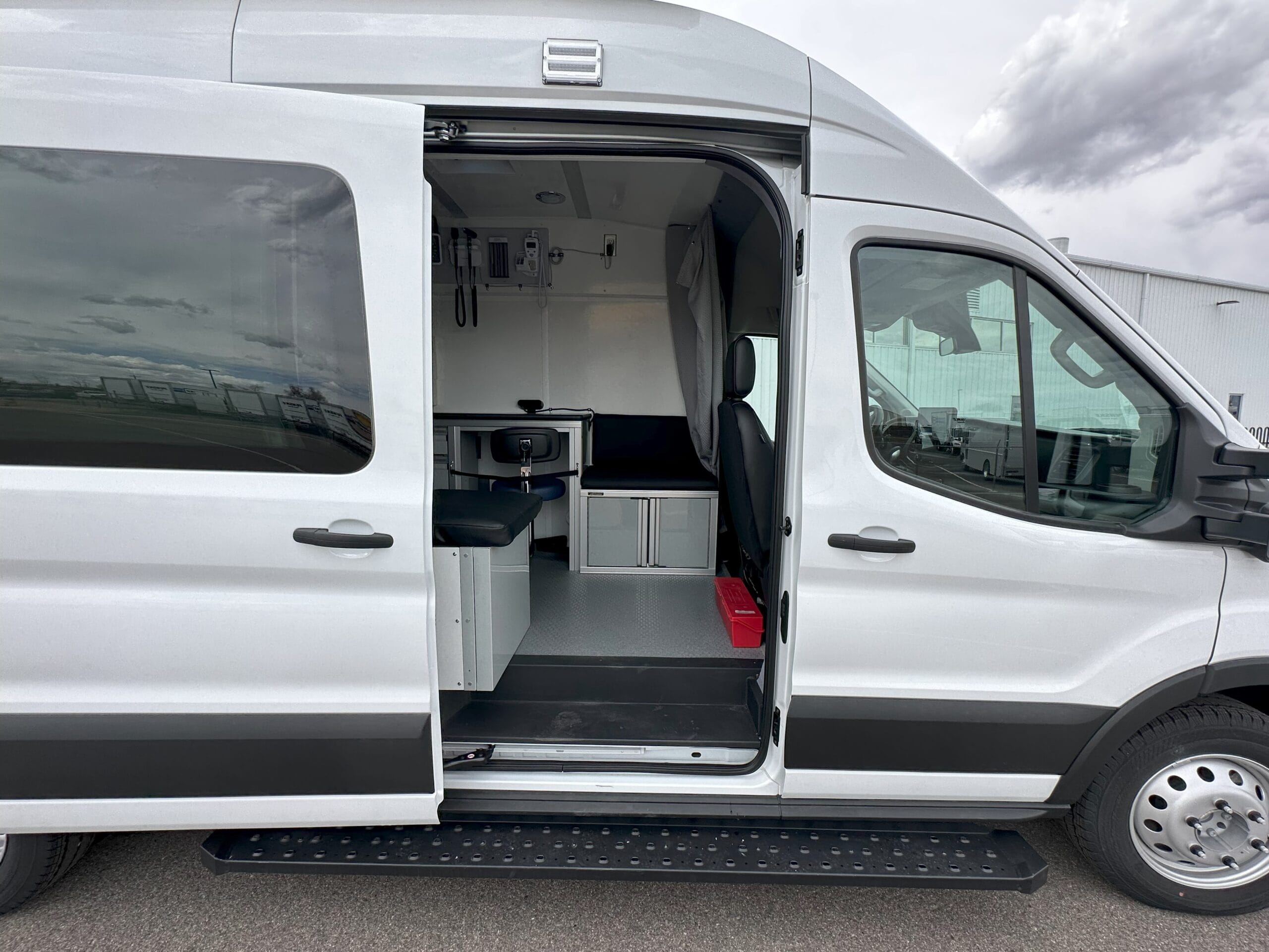 fully equipped health service vehicle for sale - summit bodyworks easy access sliding door