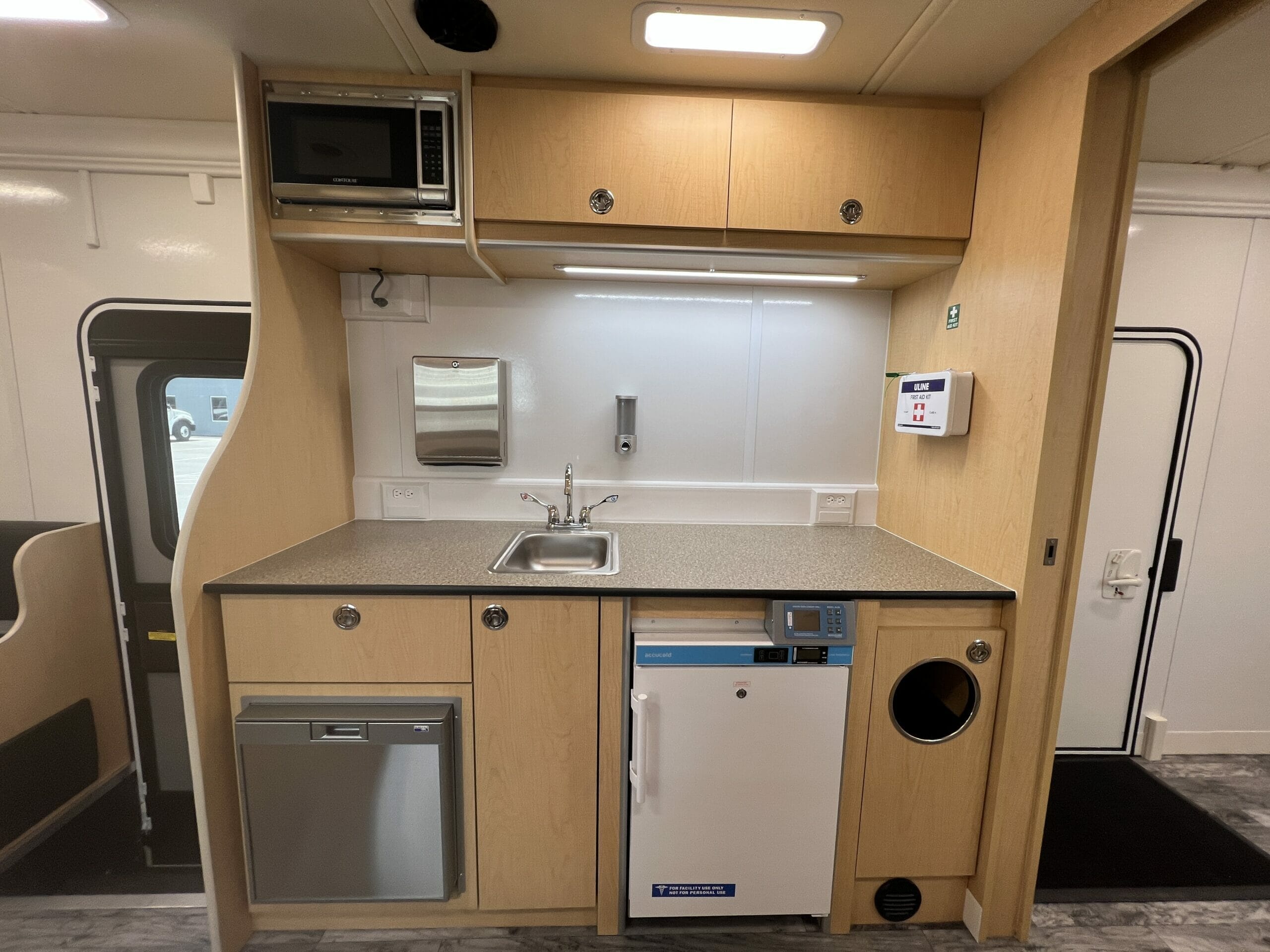 well med mobile clinic medical refrigerator and small staff refrigerator - summit bodyworks feature build